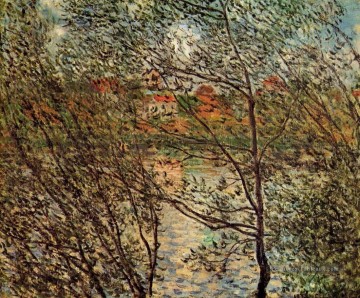 Printemps à travers les Branches Claude Monet Peinture à l'huile